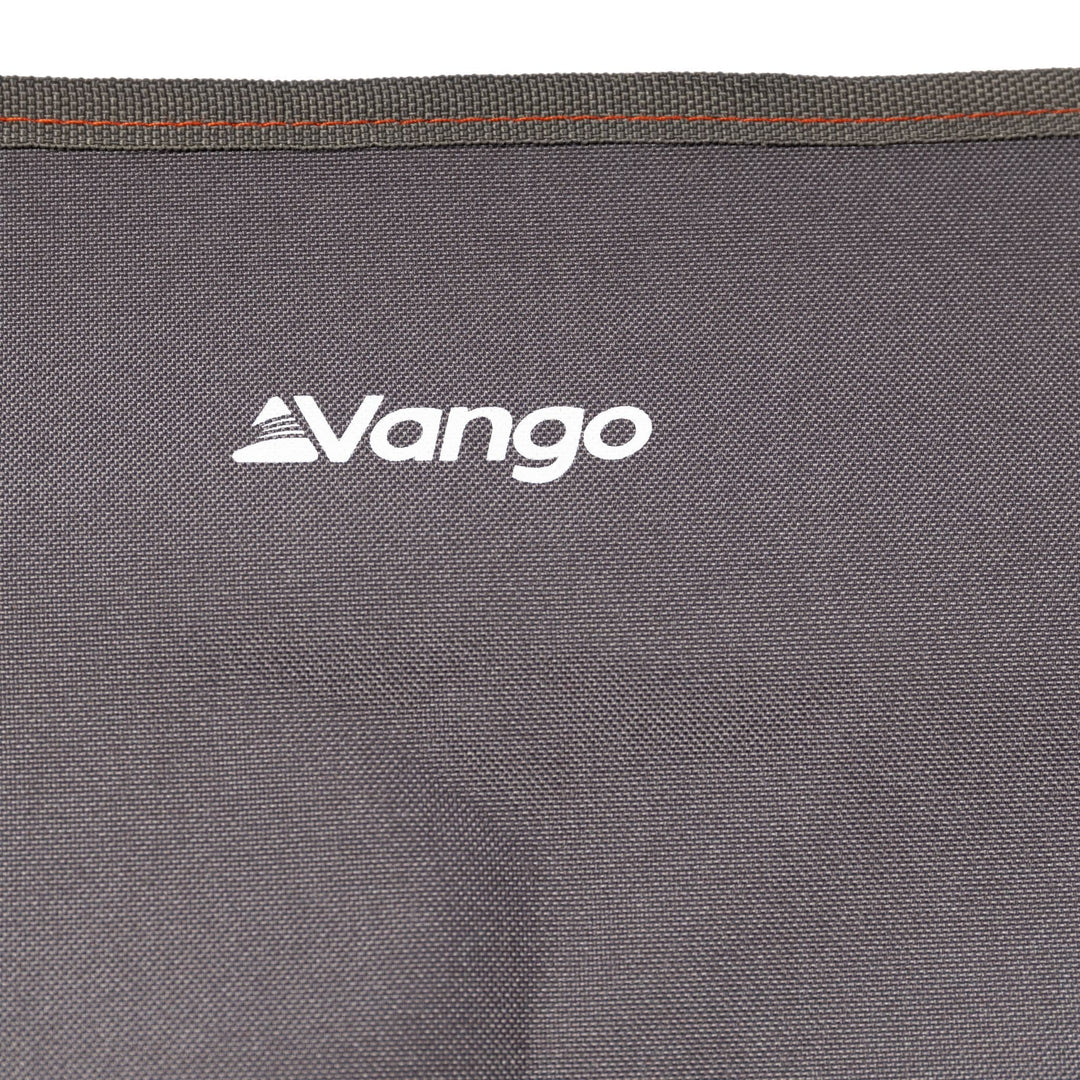 Close-up of the Vango Micro Chair Excalibur’s grey fabric with the Vango logo, highlighting its durable polyester material.