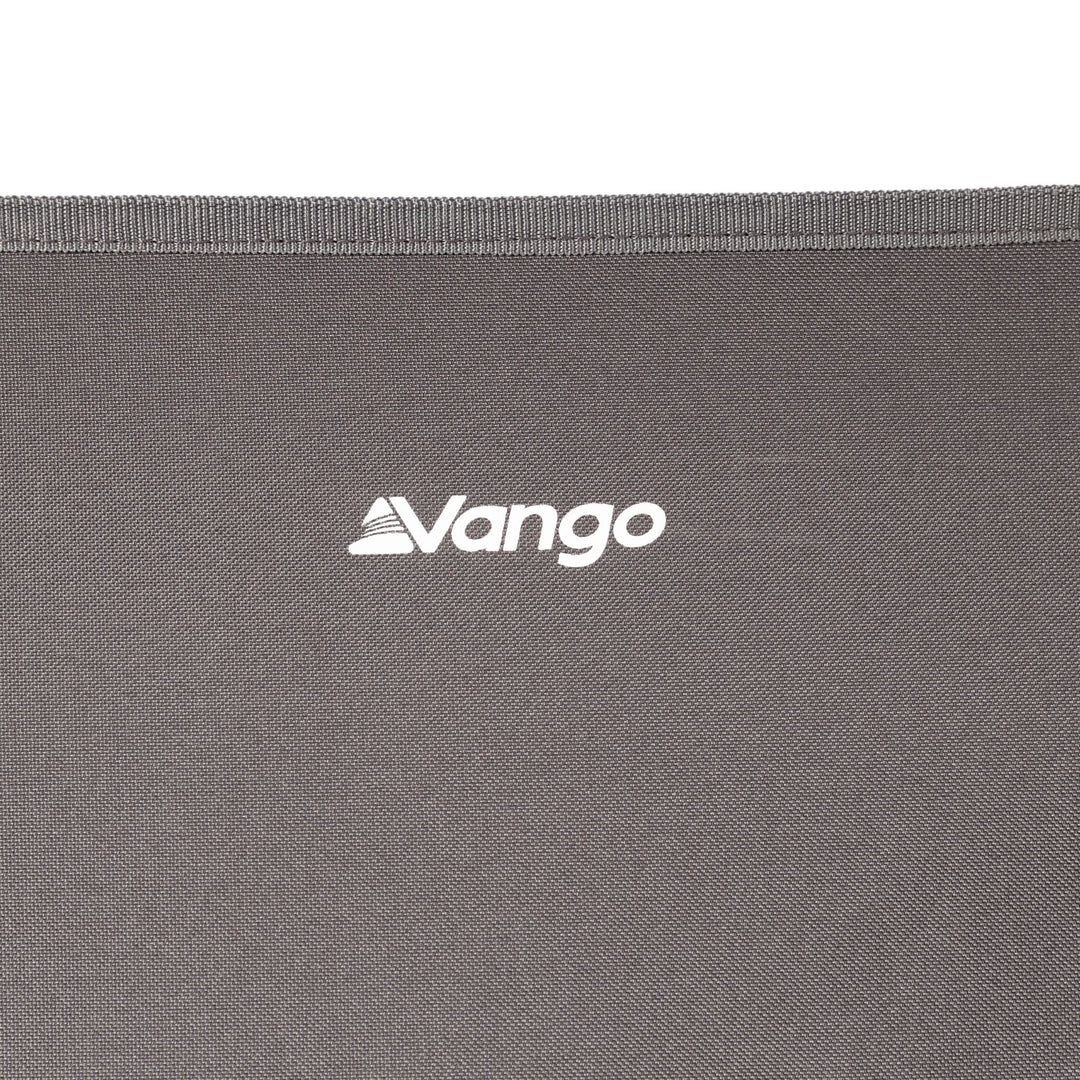 Vango logo on the durable fabric of the Micro Lux Chair (Excalibur), emphasising quality construction for outdoor use.