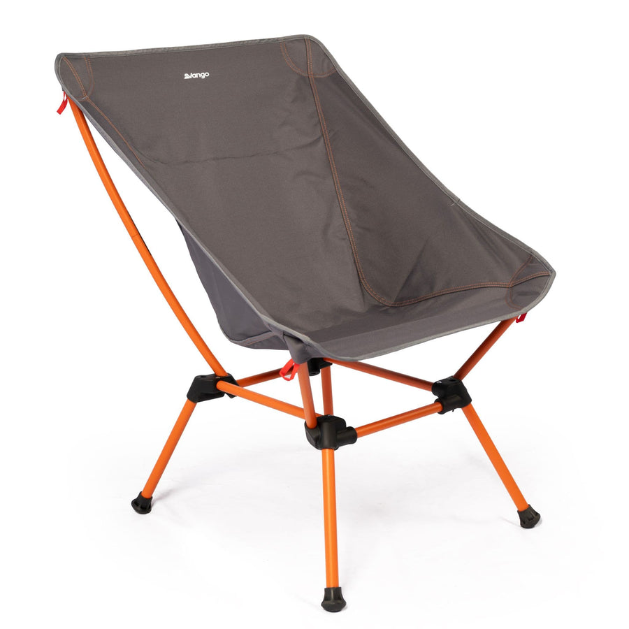 Side view of the Vango Micro Lux Chair (Excalibur), a lightweight camping chair with a durable fabric seat and orange steel frame.