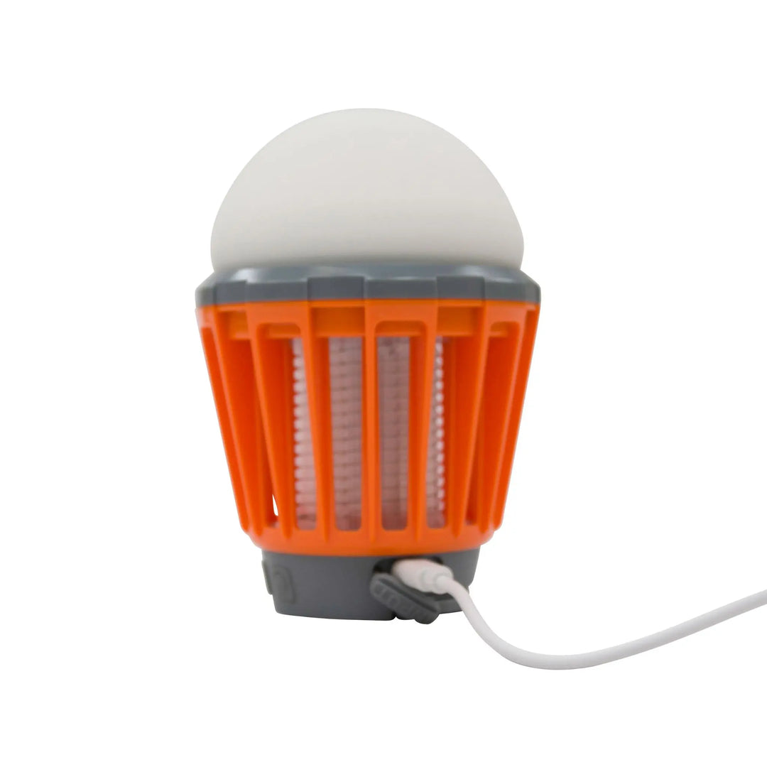 Side view of the Vango Midge 180 Camping Light in orange, showing its durable connection for recharging.