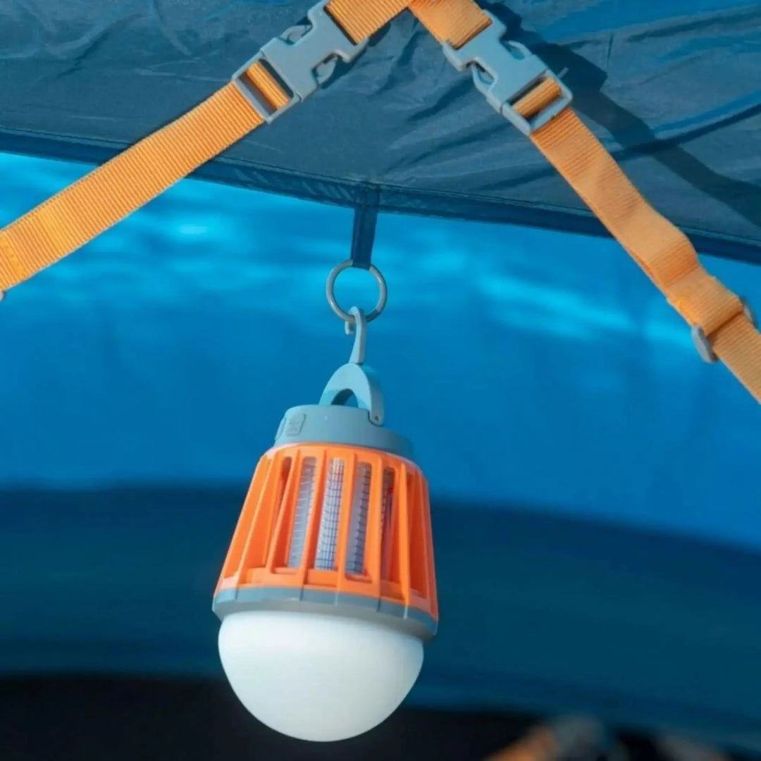 Vango Midge 180 Camping Light hanging in a tent, providing LED lighting and insect protection.