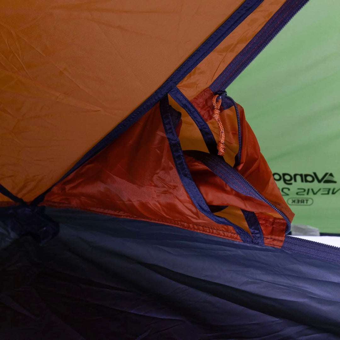 Interior pocket of the Vango Nevis 300 tent for rolling away the front door.