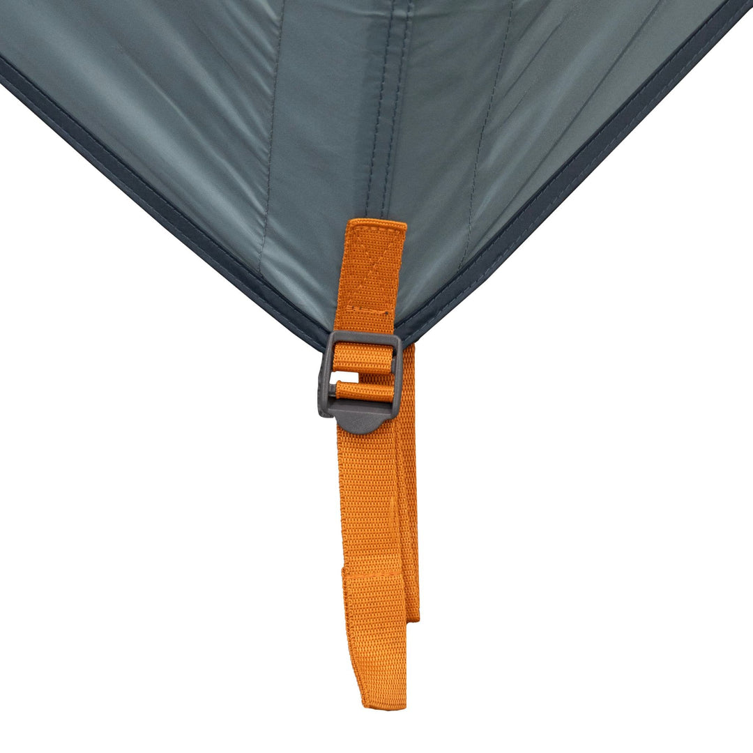 Close-up of an orange tension strap on the Vango Tahoe 400 4 man tent, showcasing its secure attachment point for stability.