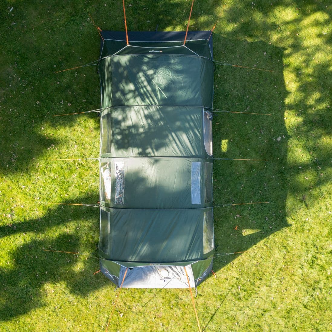 Aerial view of the Vango Sherwood 400XL Poled Tent, a 4-man tent, fully pitched on a grassy lawn.