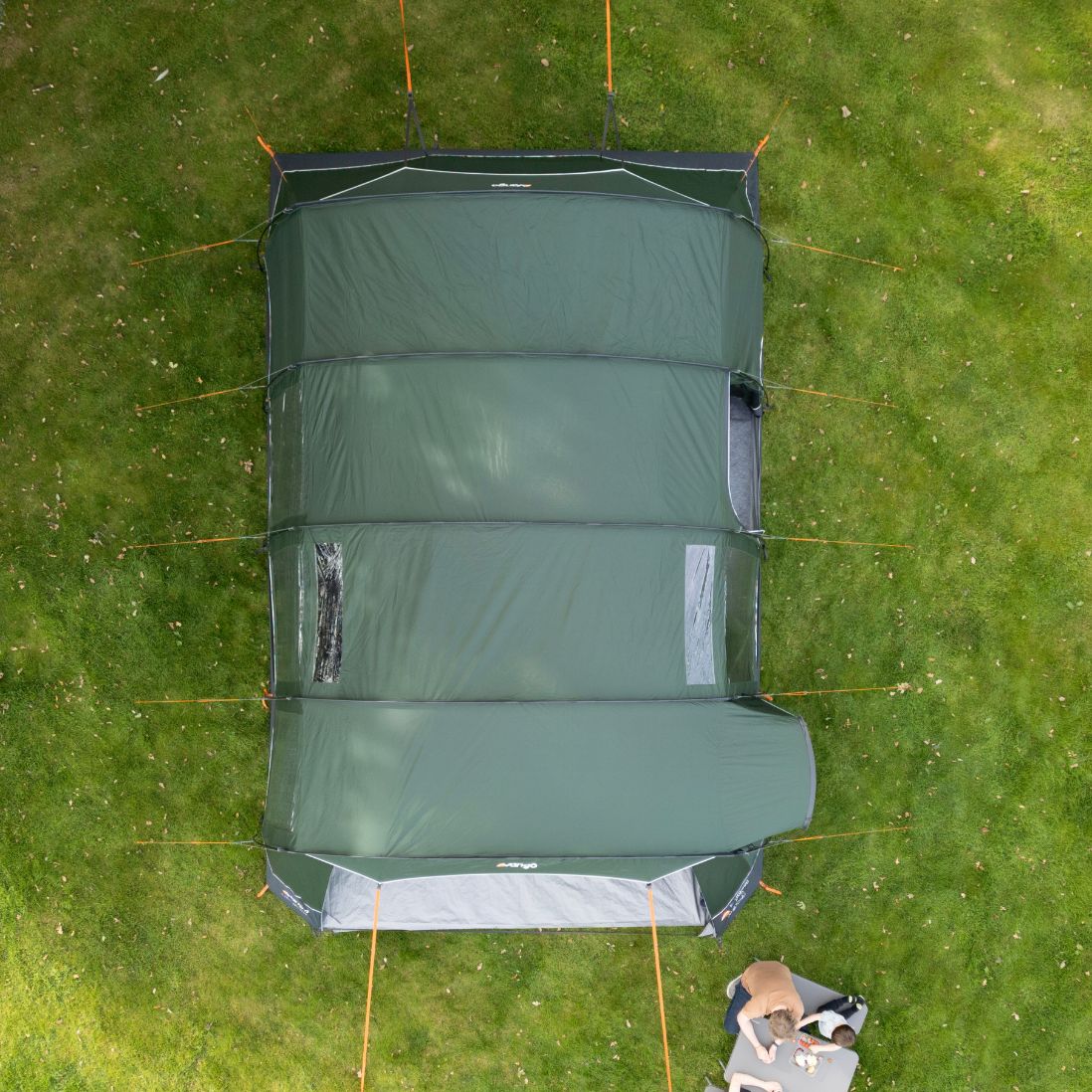 A top-down aerial view of the Vango Sherwood 600XL Poled Tent pitched on grass, emphasizing its large footprint as a 6 man family tent.