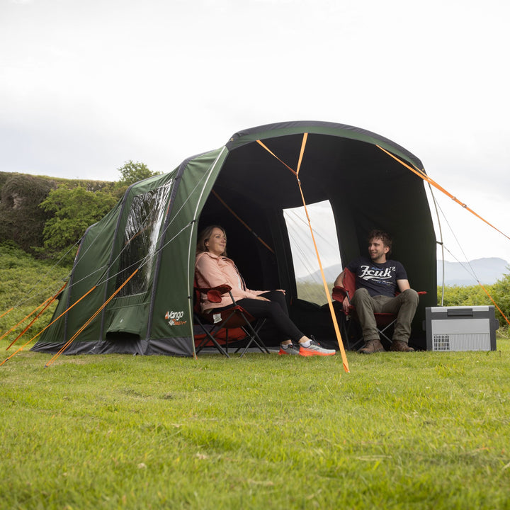 Vango Sierra Air TC 300 AirBeam Tent Lifestyle image with people sitting under the canopy