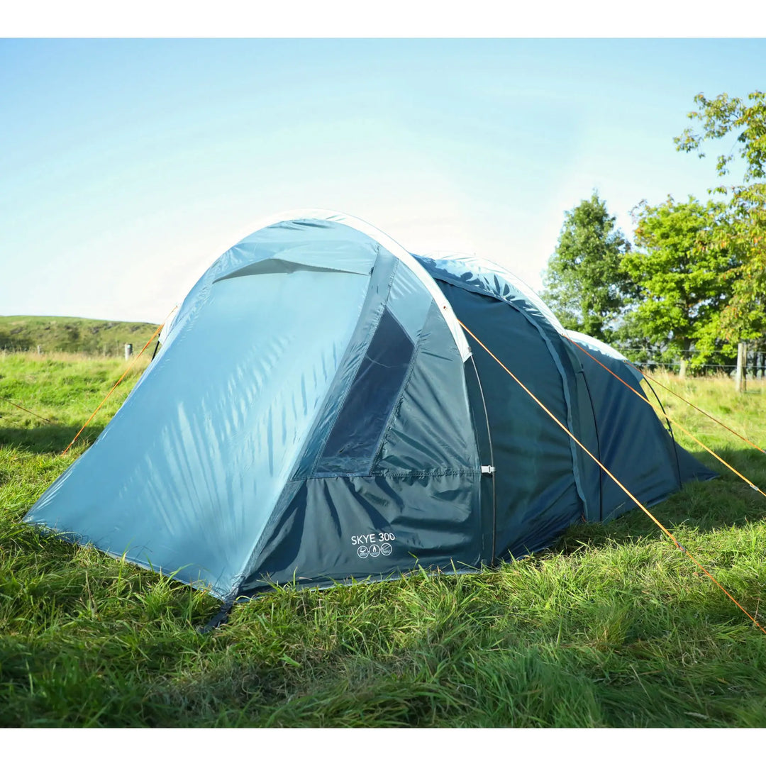 Vango Skye 300 tent fully pitched on grass with all doors closed, clear window panel and logo visible near the base.