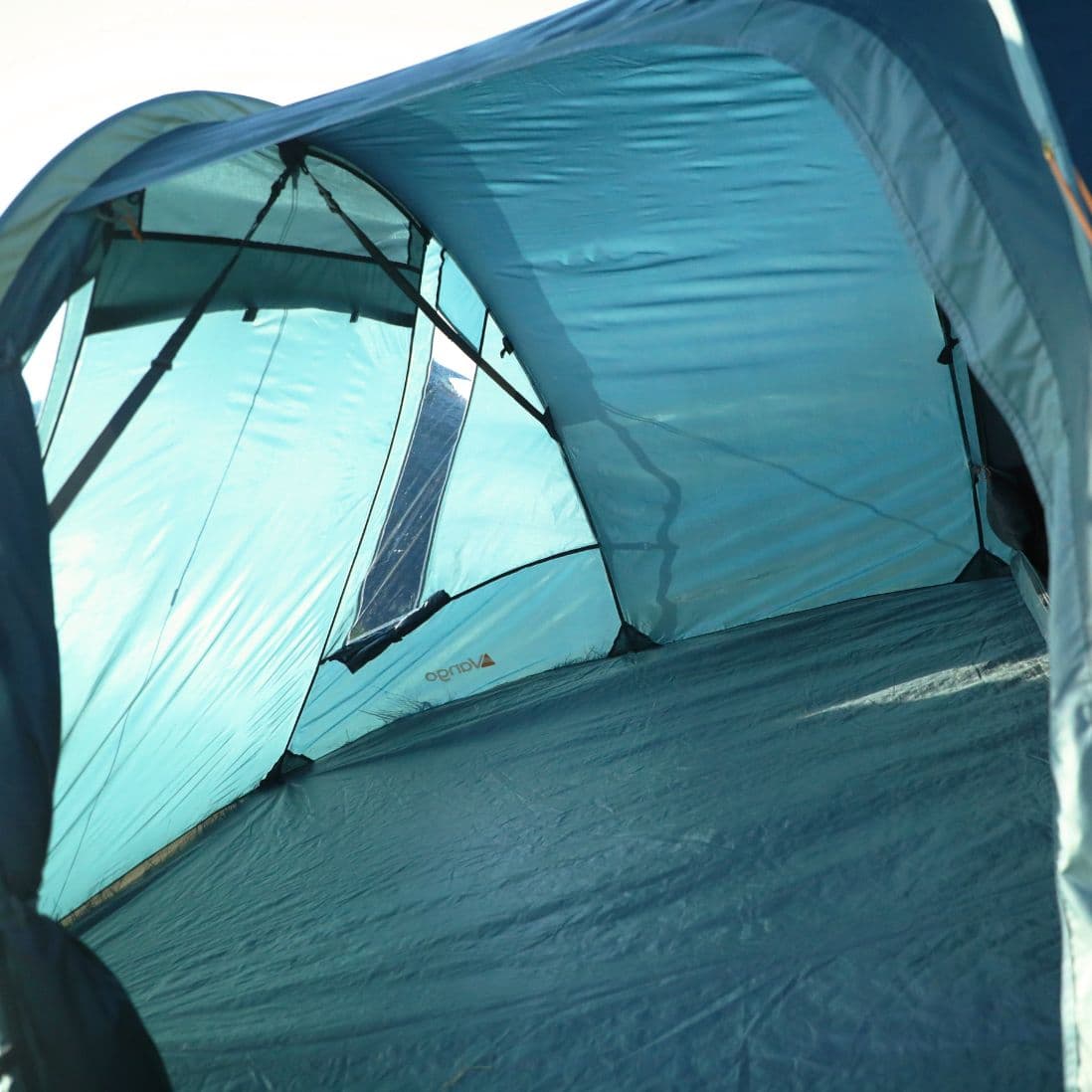 Interior view of the Vango Skye 400 Tent living area, showing the generous space for storage or relaxation, a perfect 4-man tent for festivals and short breaks