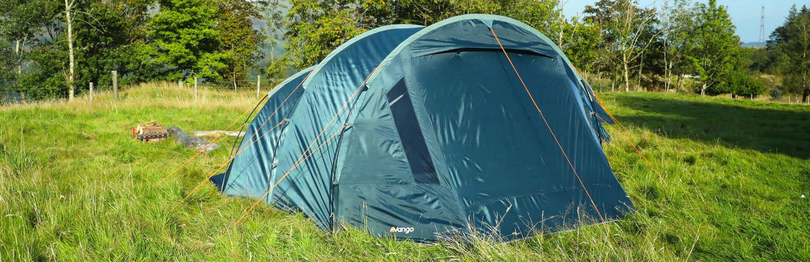 Vango Skye 500 tent in a festival setting, showcasing its sleek design and robust construction for 5-person use.