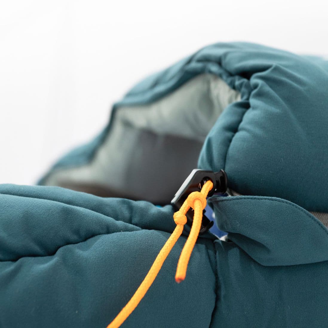 Close-up of the drawstring hood on the Vango Stellar Double sleeping bag, designed for adjustable warmth and a snug fit.