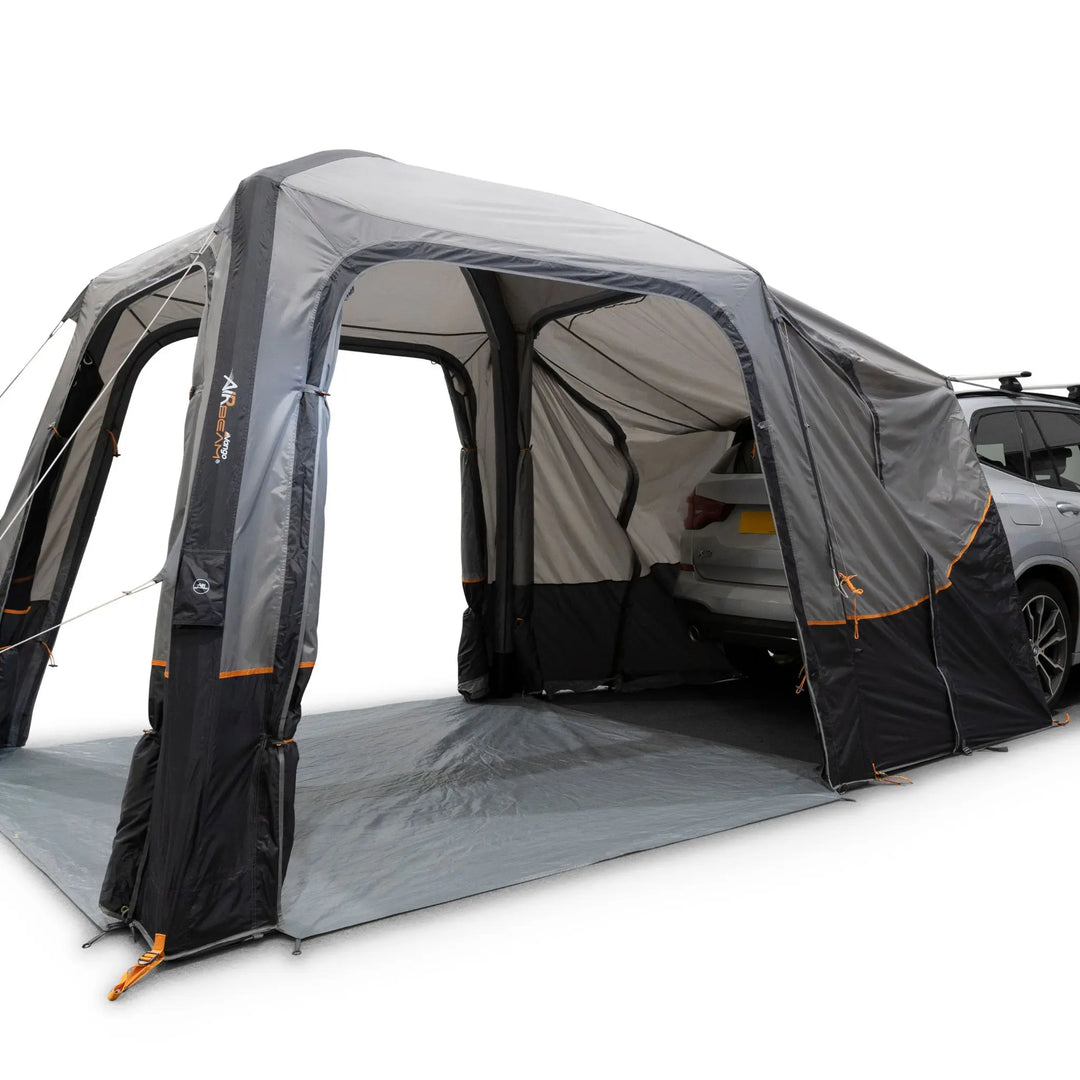 Vango Tailgate AirHub II Low Drive Away Awning attached to rear of a car with a awning doors open.