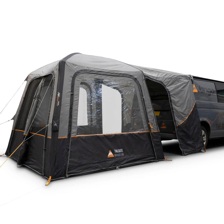 Corner view of the Vango Tailgate AirHub II Low Drive Away Awning with connection tunnel door open.
