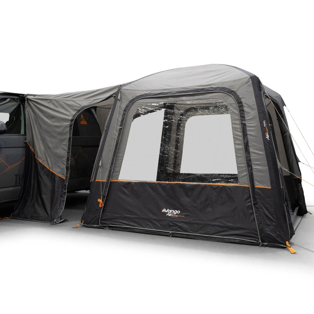 Side view of the Vango Tailgate AirHub II Low Drive Away Awning attached to the side of a VW campervan.