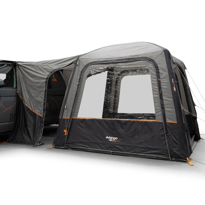 Side view of the Vango Tailgate AirHub II Low Drive Away Awning attached to the side of a VW campervan.