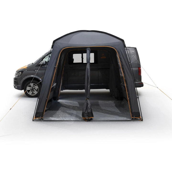 Interior view of the Vango Tailgate Hub II Low Awning with attached campervan, showcasing ample space and Linked-In Groundsheet.