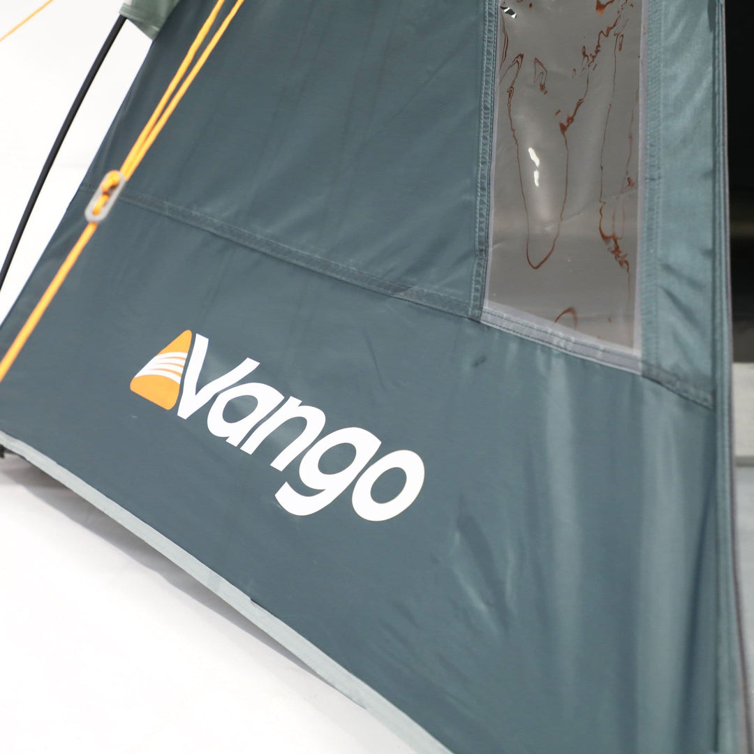 Close-up of the Vango logo on the side of the Vango Tay 400 tent, highlighting brand quality and attention to detail for festival-ready tents.