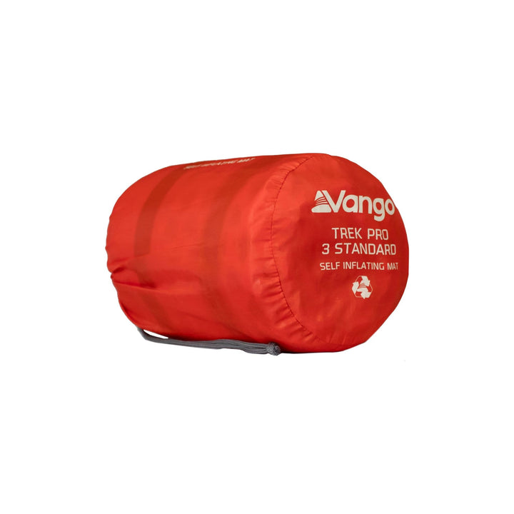 The Vango Trek Pro 3 Standard self-inflating mat stored in its red carry bag, ideal for compact camping gear.