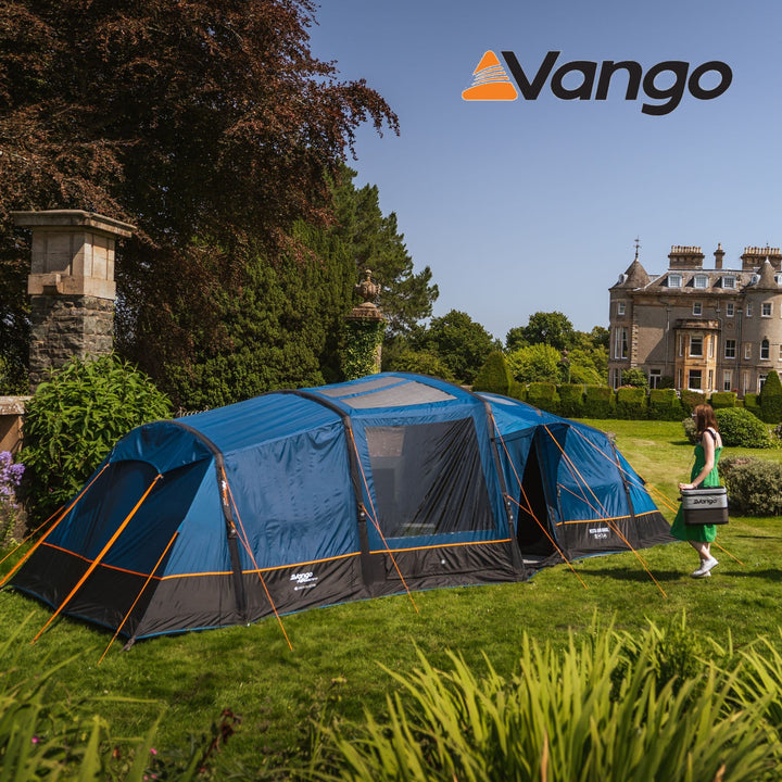 Vango AirBeam Vesta Air 850XL Tent with a woman walking into the tent